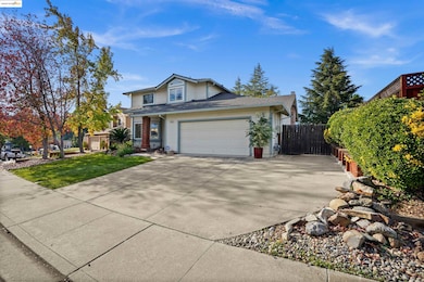 Traditional-style house featuring driveway and a garage
