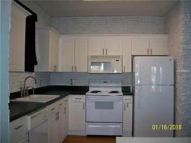 9401 Crescent Loop Cir unit 206, Tampa, FL 33619 - photo 2