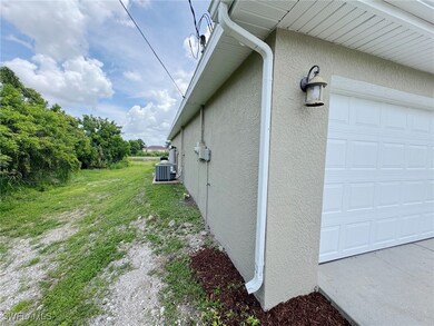 View of home's exterior featuring stucco siding an