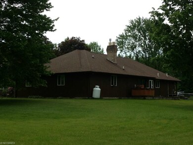The rear view from within the fenced in back yard.