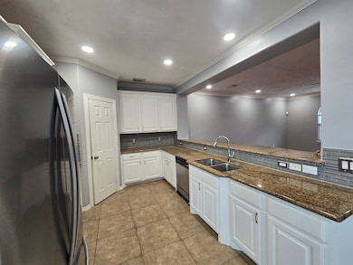 Tons of cabinets space and gorgeous granite counte