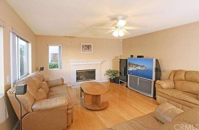This bright and open family room with light wood f