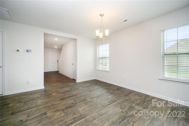 View of Dining Area, Wide Hallway, Coat Closet and Foyer