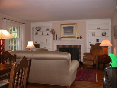 Living Room. View of built-ins and woodburning fir