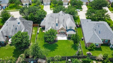 Aerial view of the huge lot and lush landscaping.