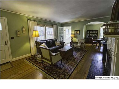 Living room with gorgeous hardwood floors, big win