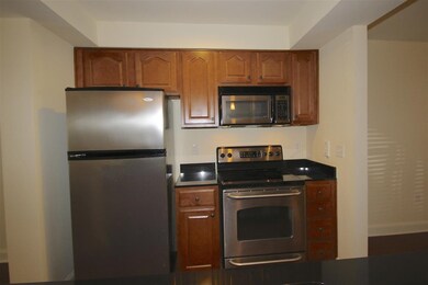 Kitchen with stainless steel appliances.
