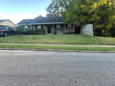View of front of house featuring a front lawn