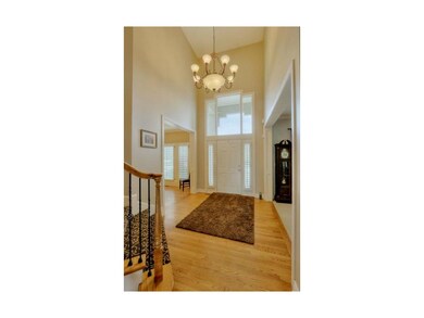 Two story entry boasts loads of daylight and hard 