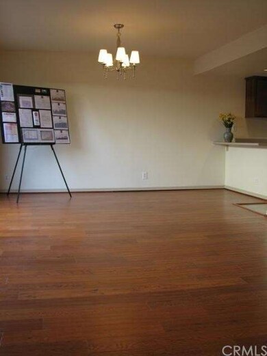 DINING AREA OPEN TO THE KITCHEN AND LIVING ROOM