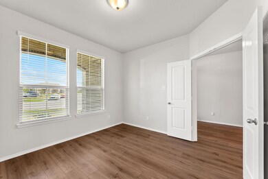 Front office or flex room with double doors and pl