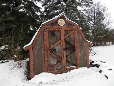 Storage shed in side yard