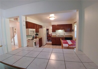 Kitchen viewed from the Family Room - this tiled s