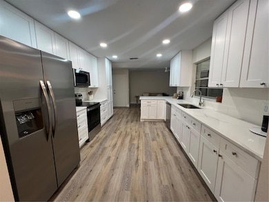 Kitchen from 2nd Living view