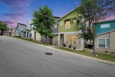 Townhome / multi-family property featuring stone 