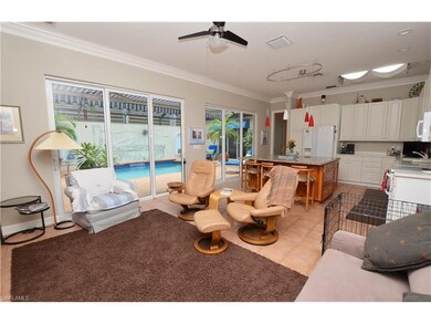 Family room looking back to spacious kitchen.