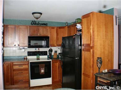 Kitchen. Updated kitchen with cherry cabinets.