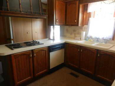 Electric cook top, dishwasher and plenty of cupboa