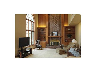 Family Room. The massive brick wood burning FP is 