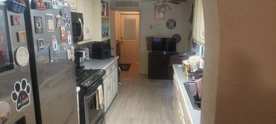 Kitchen featuring appliances with stainless steel 
