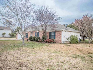 This country living home is as close to town as one can get and still be in the country.