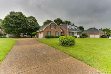 Aggregate driveway with 2 car garage and entrance