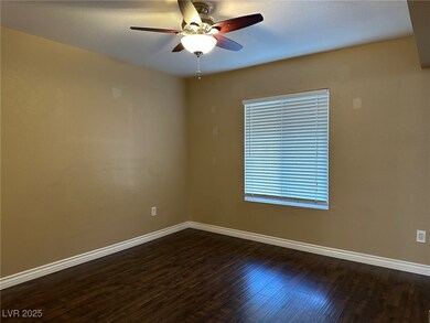 Unfurnished room featuring dark wood finished floo