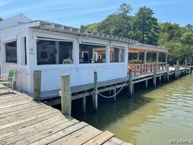 LAND IS 1/2 PAST THE URBANNA SEAFOOD MARKET