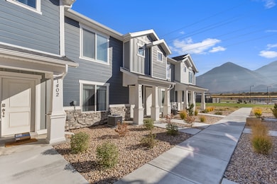 View of home's exterior with stone, siding and a central AC unit