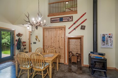 Wood stove, dining area, loft above