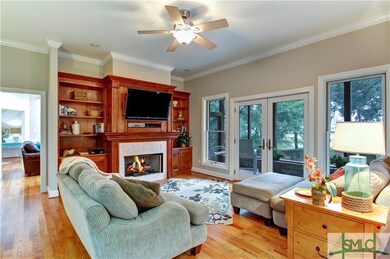 Family room has fireplace with gas logs, built-in 