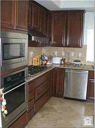 Kitchen with Stainless Steel Appliance