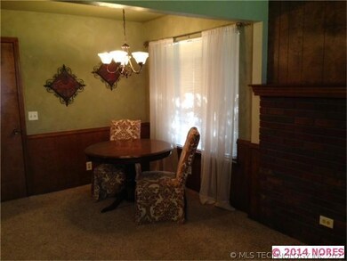 Adjacent to the living, the dining area features d