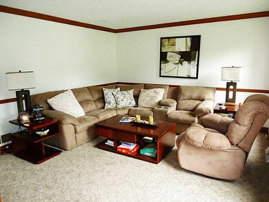 Living Room. Formal living room has chair rail and