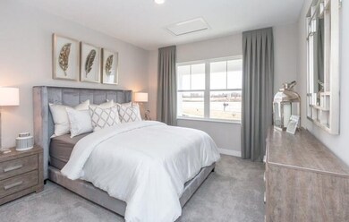 Photo is of a similar home or model.