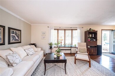 ENTRY AND LIVING ROOM.