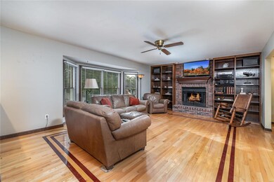 Beautiful built-in bookcases, fireplace, and bay w