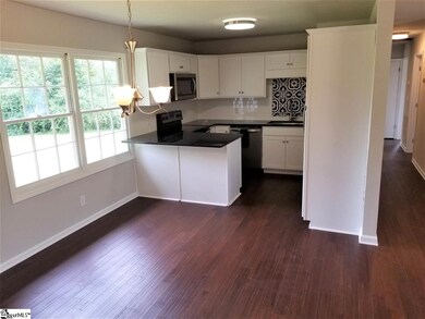 View from side entrance of dining area and kitchen