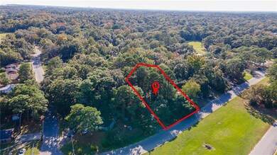 Aerial overview of property's location featuring property boundaries highlighted