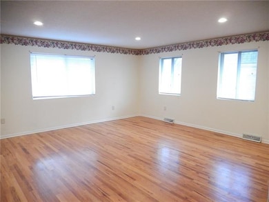 Gleaming hardwood floors abound!