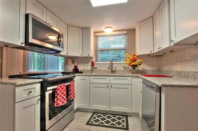 Kitchen with Granite Counter Tops & new S/S Applia