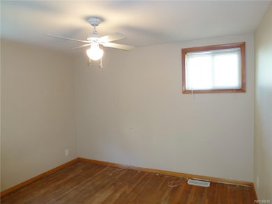 Bedroom Number 2 also has Hardwood Floors, ceiling