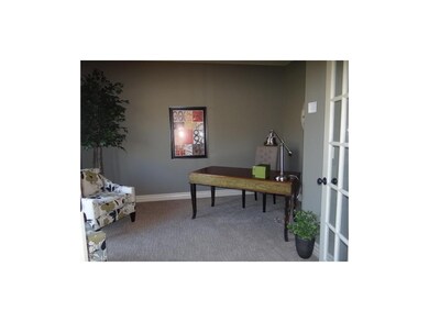 Office on main level with french doors.