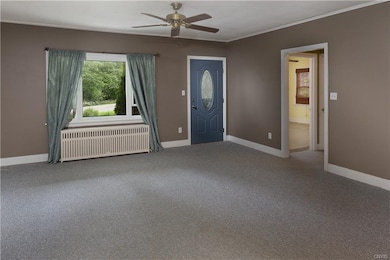 Living room looking towards front door of the hous