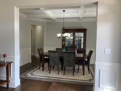 Dining room featuring dark hardwood / wood-style f