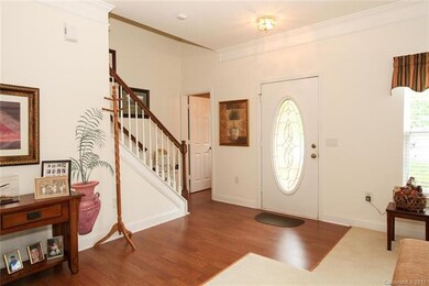 Laminate wood throughout the main floor and walkways keeps muddy shoes or paws in check!