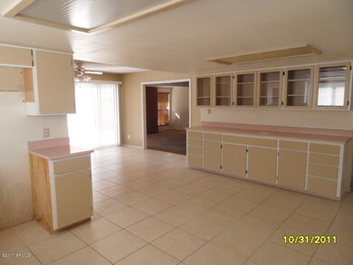 open kitchen with Tile and large Counter
