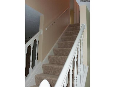 Open stairs to 2nd floor