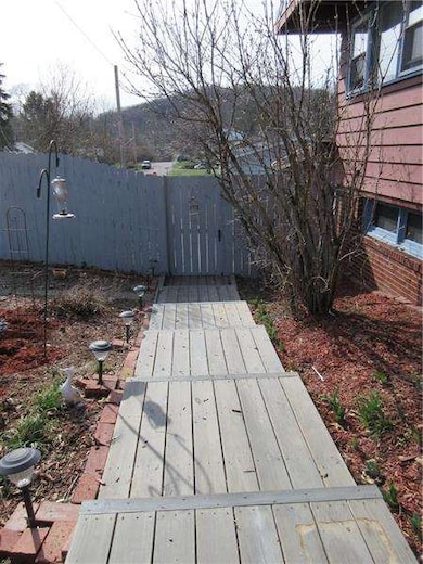 Walkway on side of house to rear yard