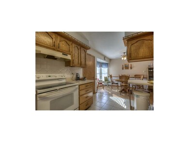 Kitchen opens to dining area. All the appliances s